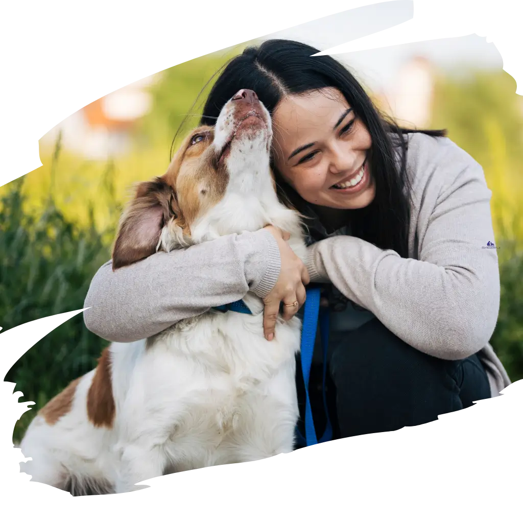 An image of a lady hugging her emotional support dog in Germany.